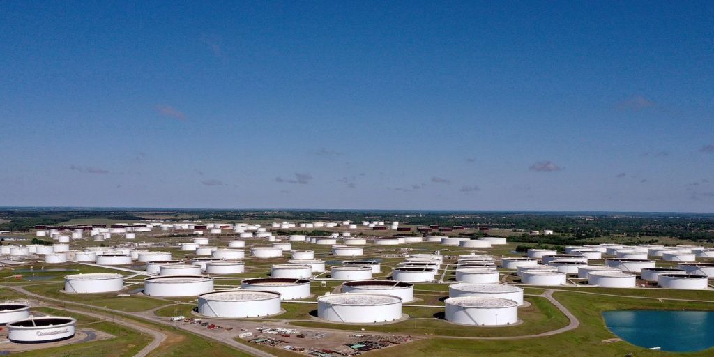 Oil settles lower as an ‘adjustment’ contributes to a nearly 8 million-barrel weekly U.S. crude supply climb