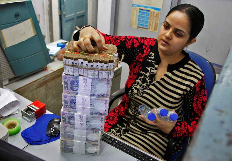 Indian rupee dips amid anticipation of Fed policy direction